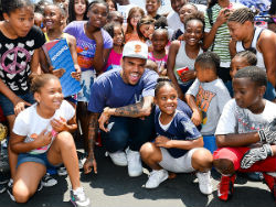 Chris Brown, Reebok Give Shoes to Kids in Need