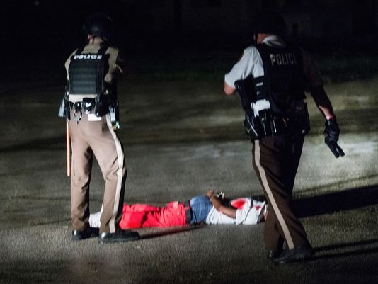 Gunfire erupts in Ferguson a year after Michael Brown died