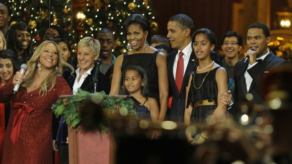 Ellen DeGeneres helps the Obamas celebrate Christmas In Washington in December 2010. (Photo: Mike Theiler, Pool, Getty Images)
