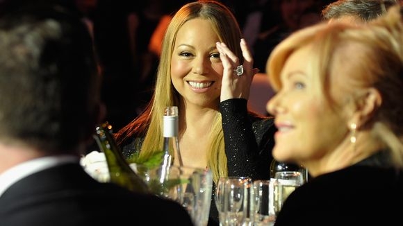 Newly engaged Mariah flashes her traffic-light ring in public