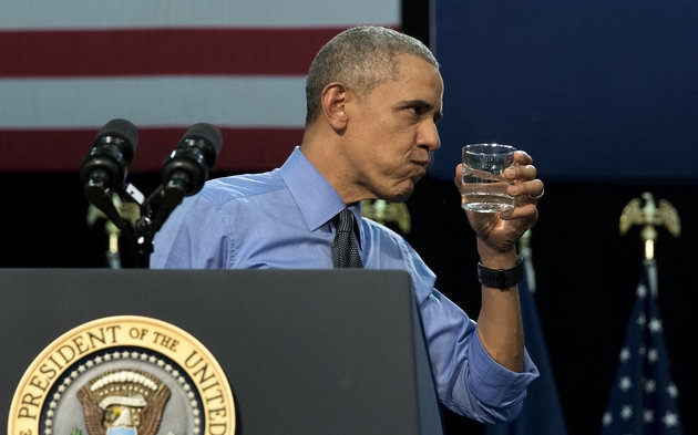 Carolyn Kaster/ASSOCIATED PRESS President Barack Obama drinks water as he finishes a speech on May 4, 2016, at Flint Northwestern High School about the ongoing water crisis in Flint, Michigan.