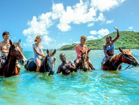 Caribbean horseback rides take you off the beach and into the water