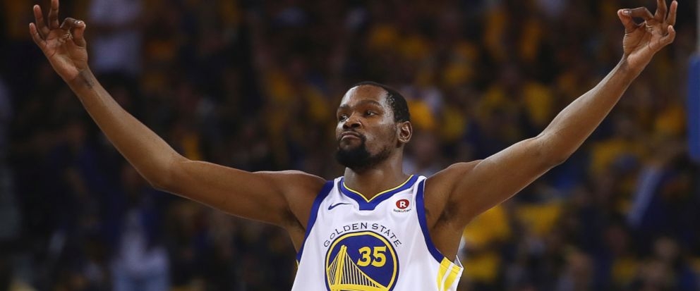 Durant, Green lead Warriors past Spurs into second round