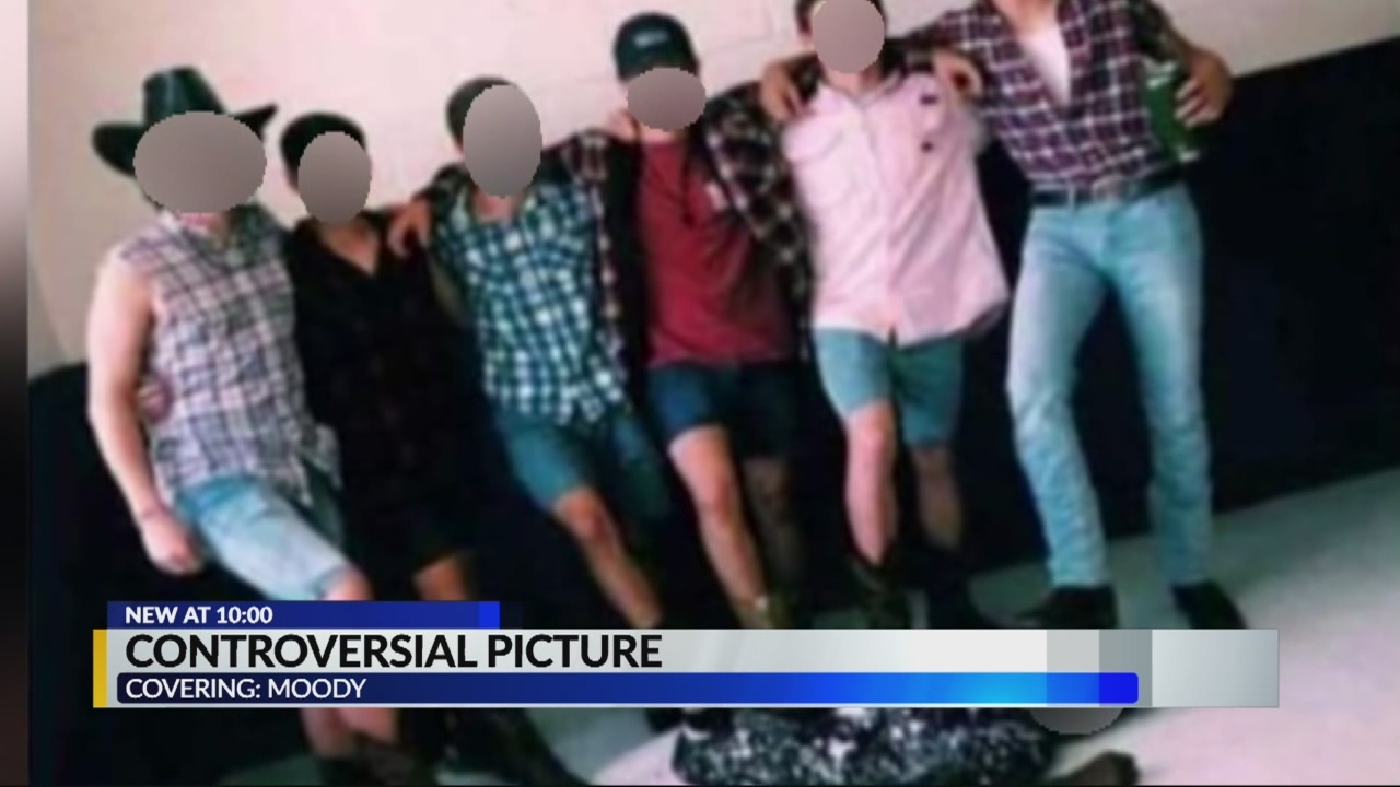 White Students In Alabama Took a Photo Standing on the Back of a Black Student