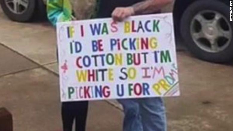 Student held racist promposal sign. Now he’s banned from the prom.