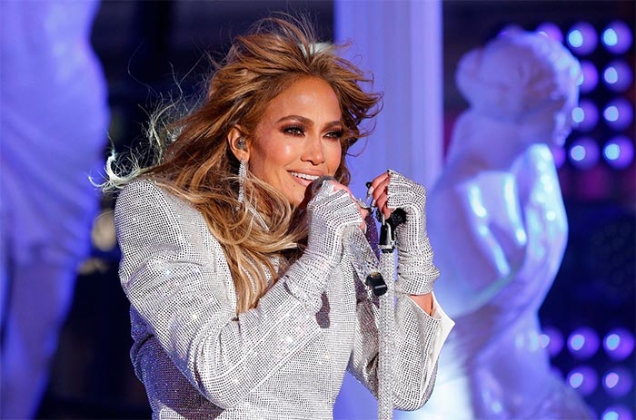 Jennifer Lopez Tears Up as She Says ‘We Lost Too Many’ During NYE Performance