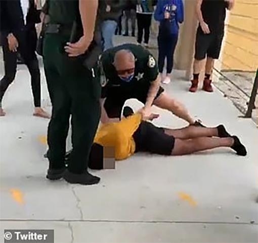 Moment Florida cop slams female student headfirst onto concrete floor