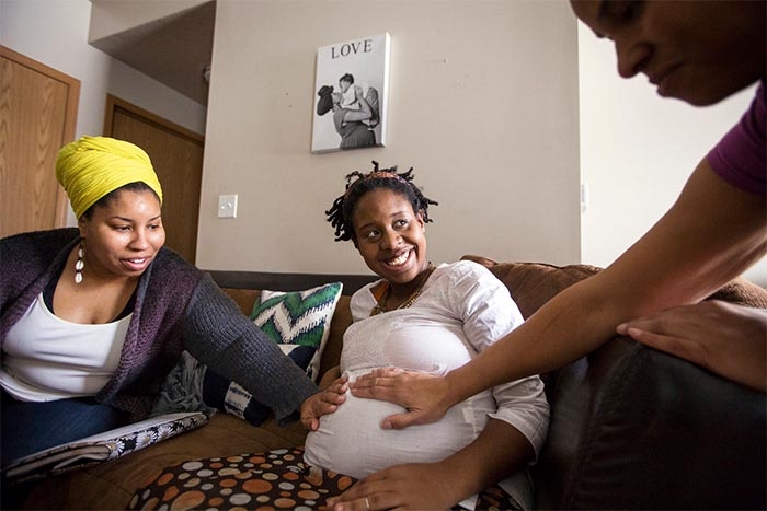 Doulas and midwives are crucial in addressing postpartum depression for Black people. Many can’t afford one.