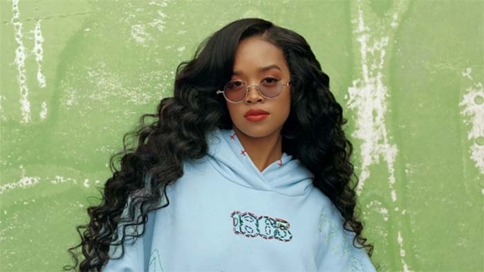 The Meanings Behind H.E.R.’s Black History-Themed Hoodie