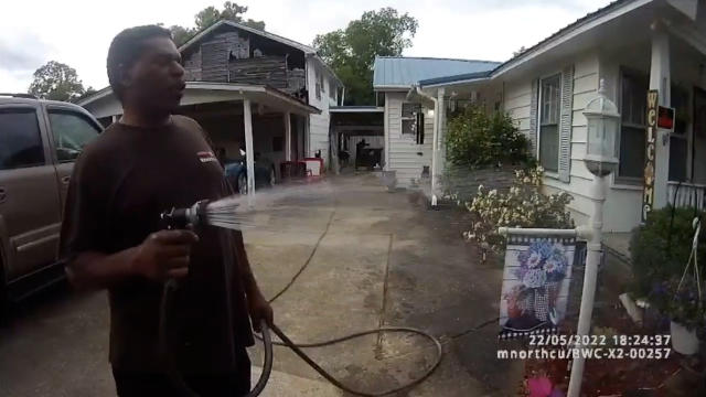 Black pastor arrested while watering flowers speaks after body camera footage release